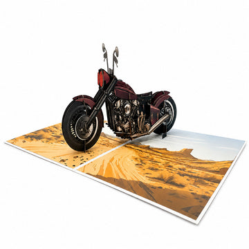 3D motorcycle pop-up greeting card displayed on a desk